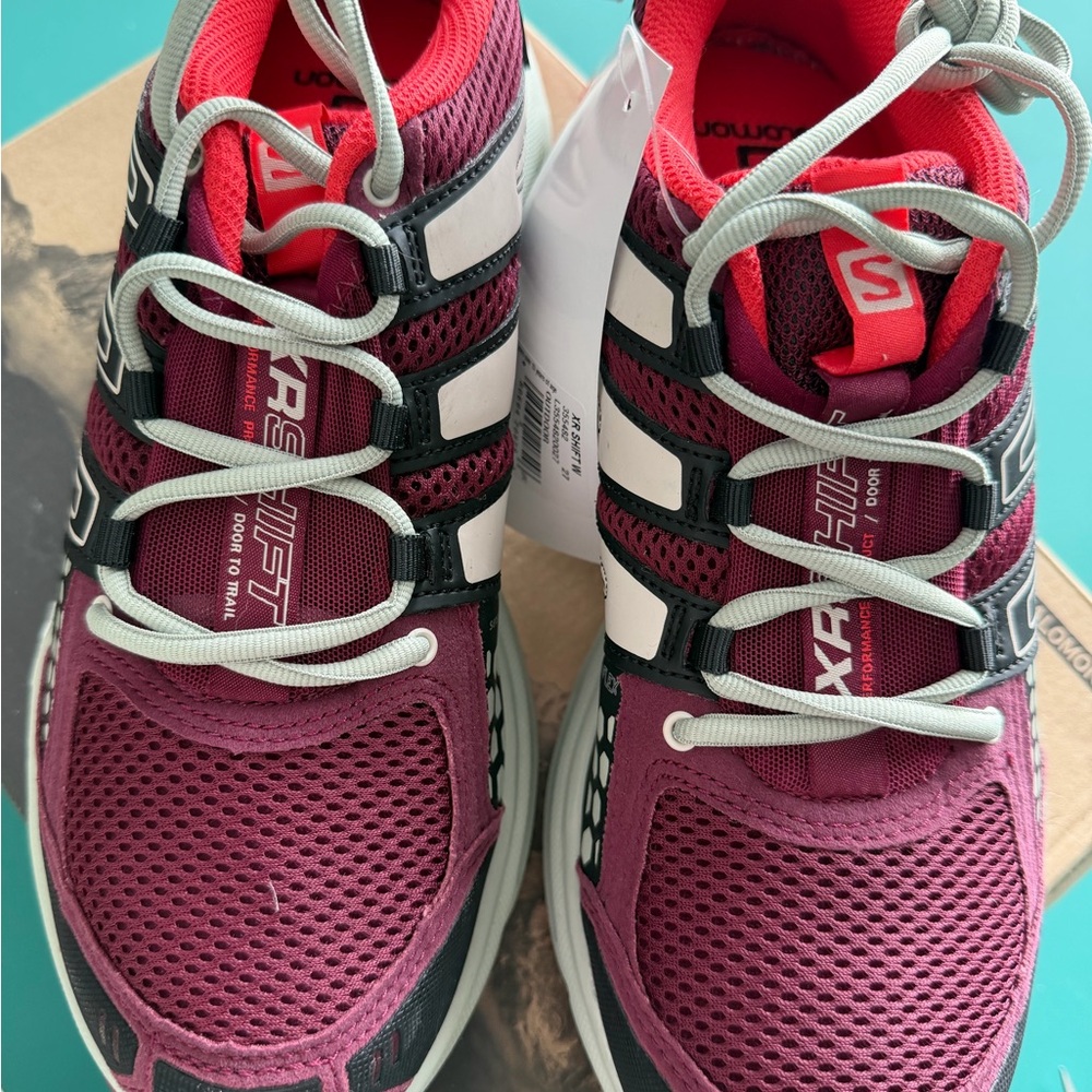 Salomon women’s Burgundy and Black Athletic/Trail Running Shoes
